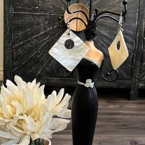 Handmade Artisan earrings made of seashell.